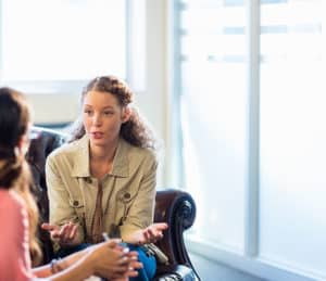 Girl counselor with PTSD client