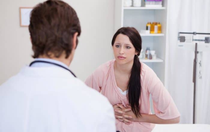 doctor prescribing adderall to a young female student