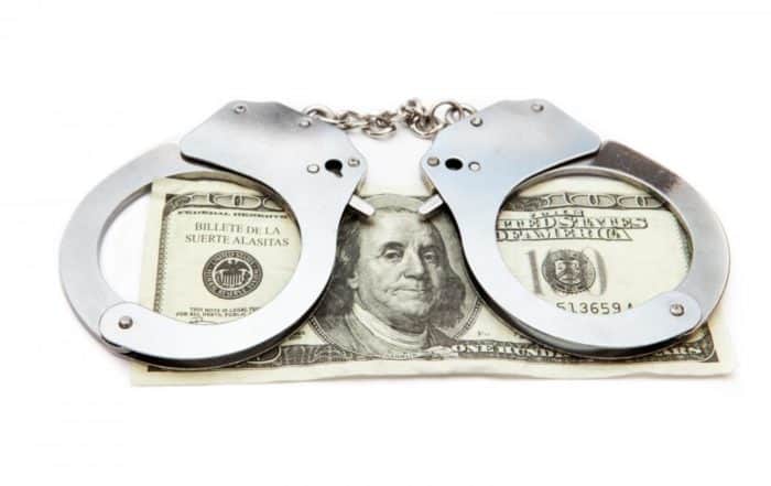 handcuffs and money